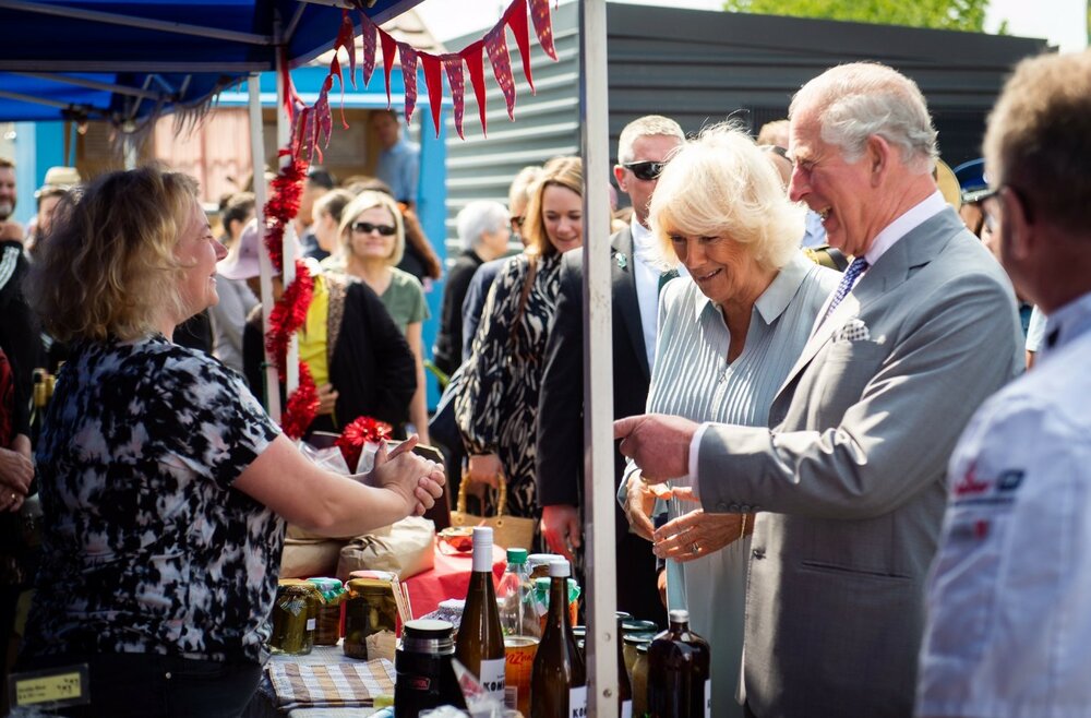 The former Prince of Wales and Duchess of Cornwall at Lincoln Farmers' Market, 2019