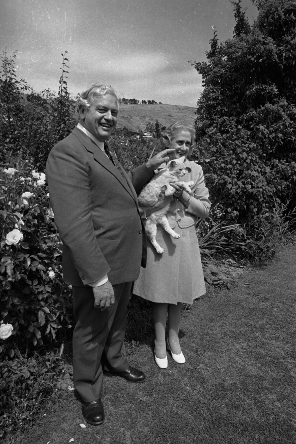 Norman Kirk and Ruth Kirk with a cat