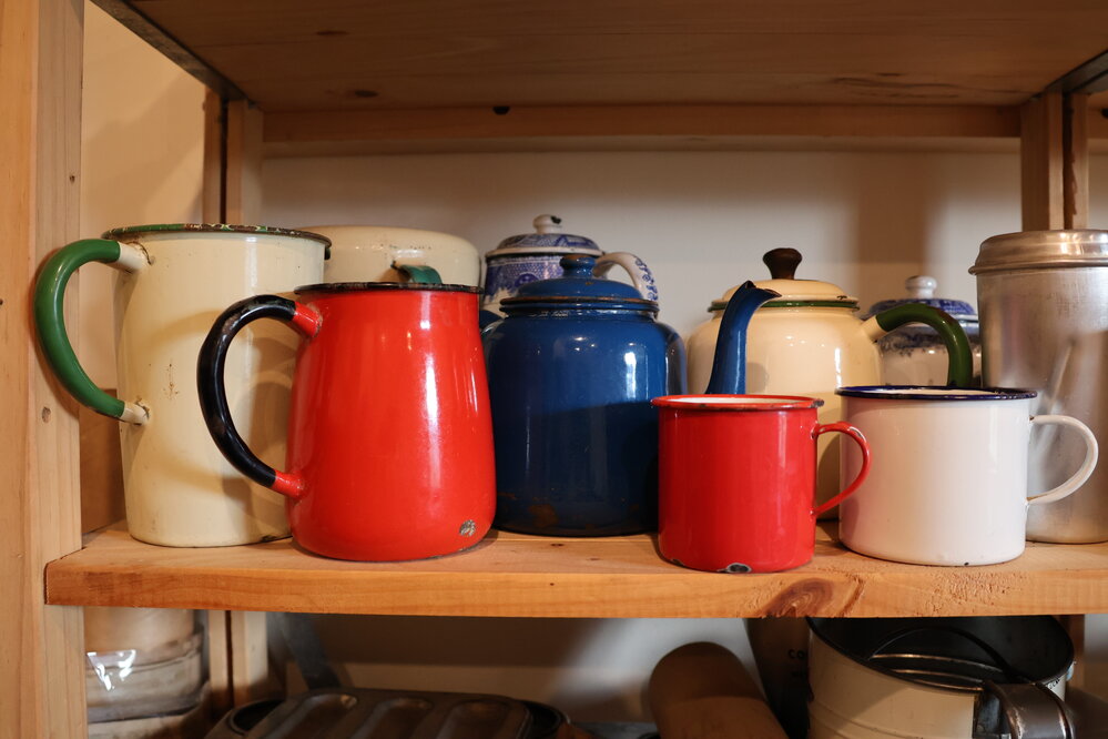 Enamel jugs at the Terrace Station kitchen museum, 2023