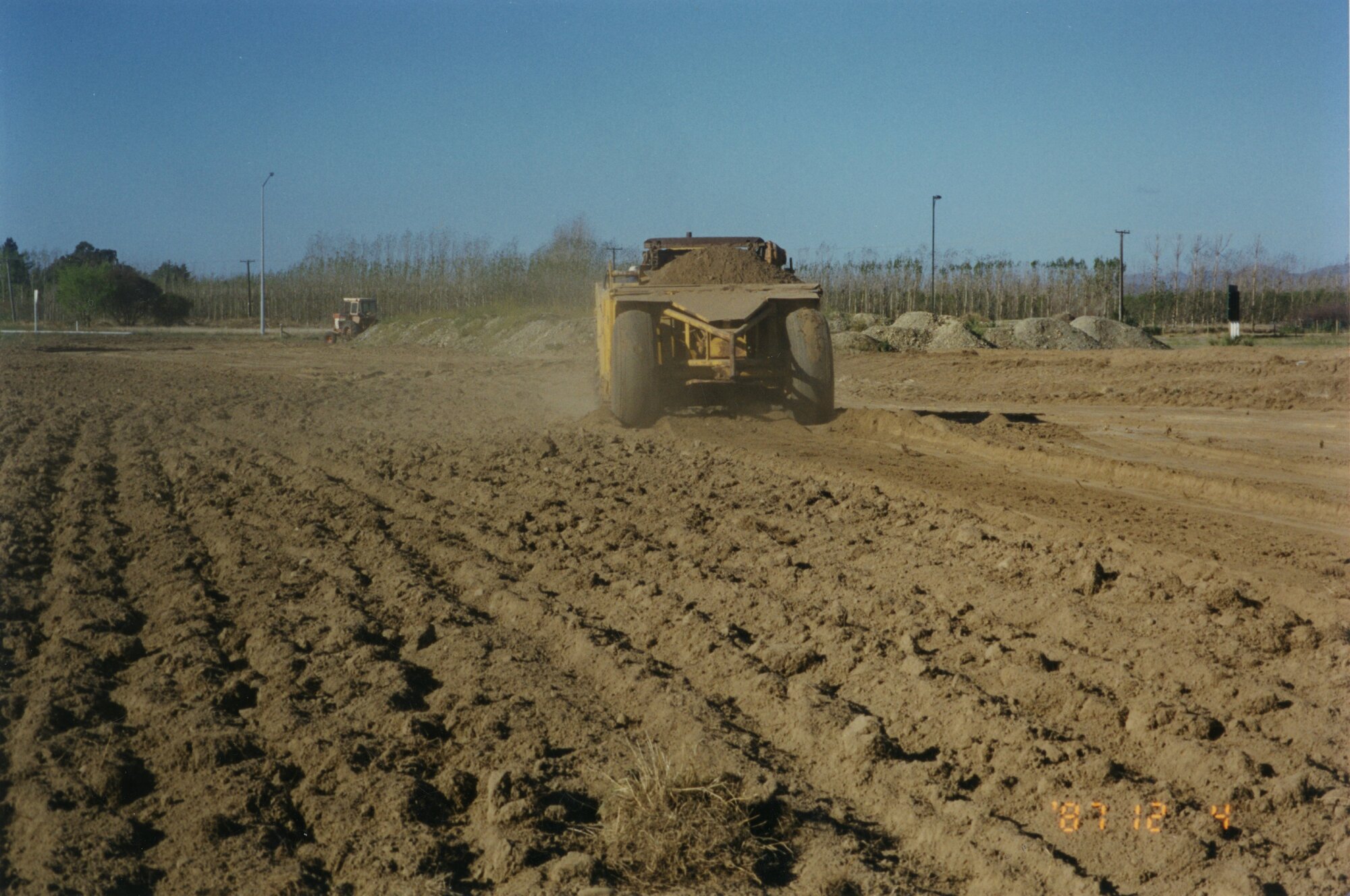 Graeme Howden earthmoving on the reserve area on State Highway 1 opposite Rolleston Railway Station