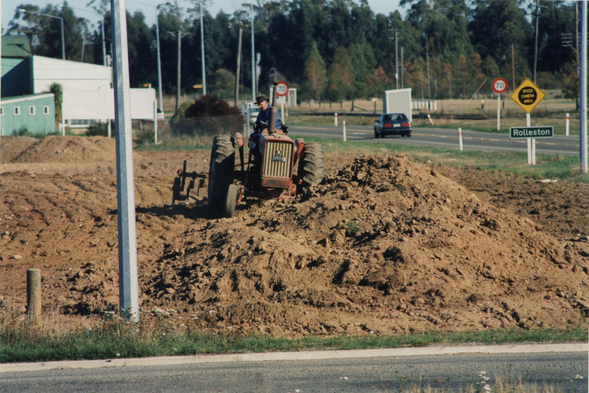 David Foster building mounds on the reserve area on State Highway 1 opposite Rolleston Railway Station