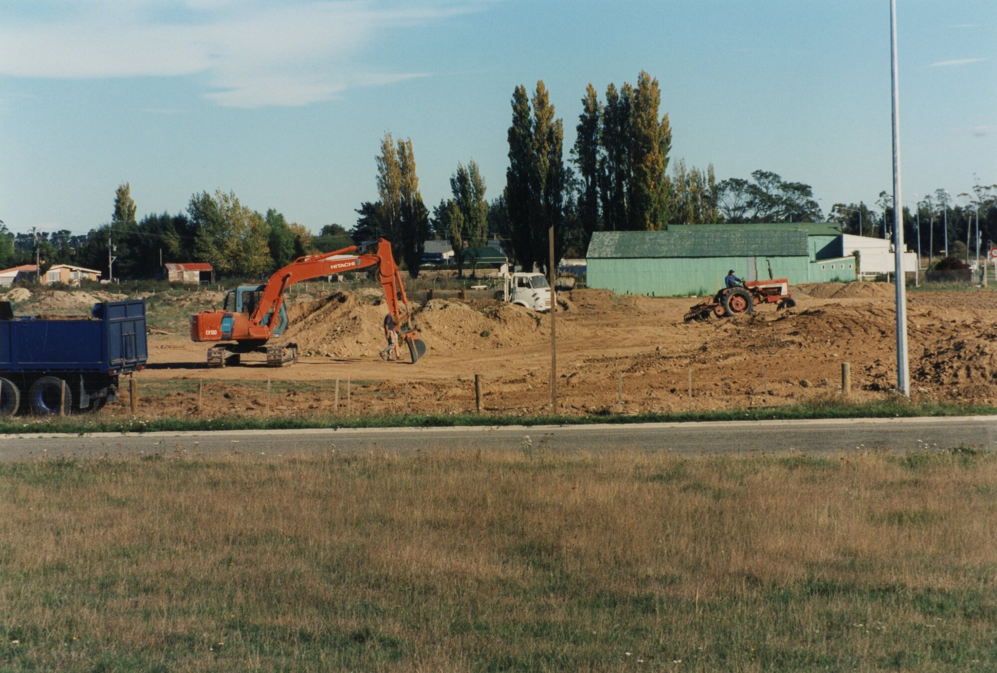 David Foster, Robert Paton and Ken Shearer working on the development of the reserve area on State Highway 1 oposite Rolleston Railway Station