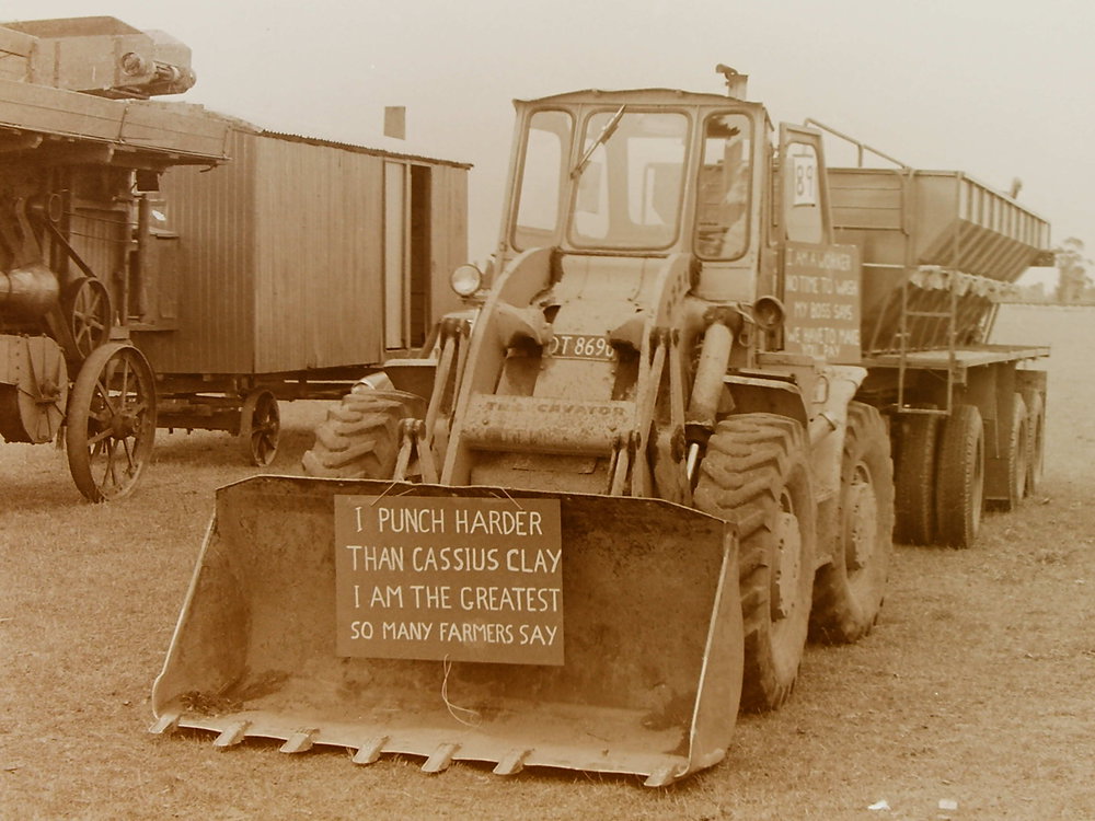 Farm equipment with Cassius Clay sign