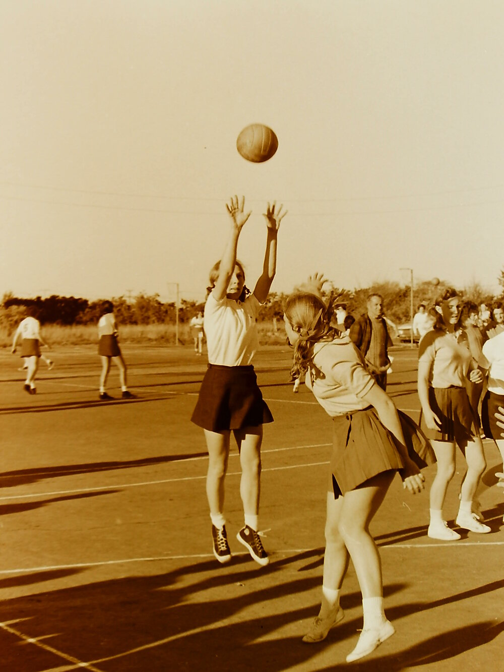 Girls playing netball
