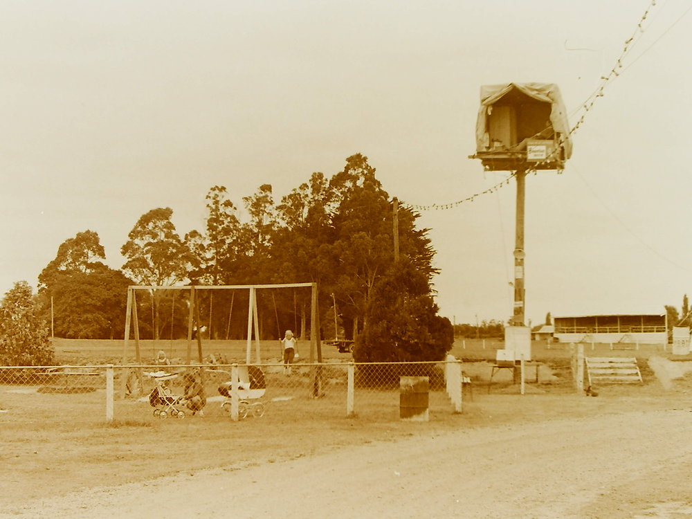 Man in pole-sitting shelter, Leeston Park