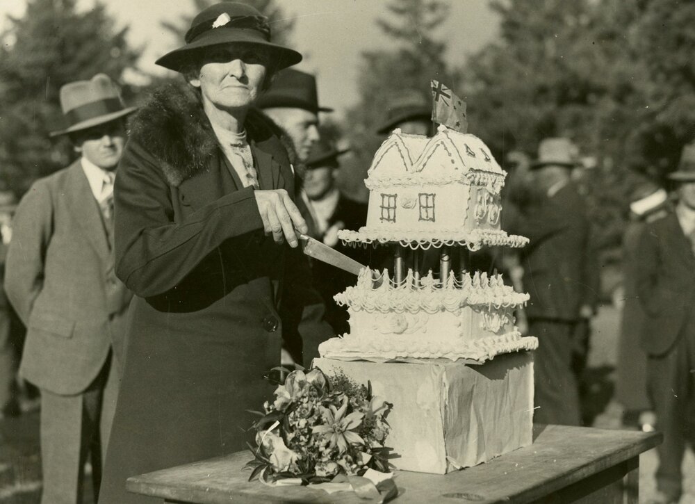 Mrs. Naismith cutting the cake at the Annat School Golden Jubilee 1936