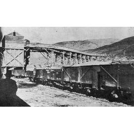 The coal bins loading coal into trucks