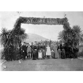 Employees welcome back Captain and Mrs. Rhodes, 1902