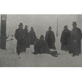 Snow near round stable