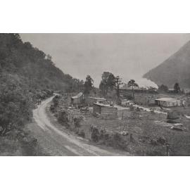 A wet day at Otira, changing engines, 1925