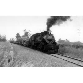 Goods train towed by locomotive 722