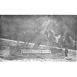 A steam navvy loading shingle into a PWD wagon 
