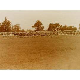 Marching girls lined up at vintage machinery show