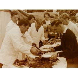 Group about to eat at community hangi