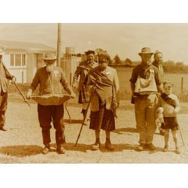 Group of men in old-style costumes