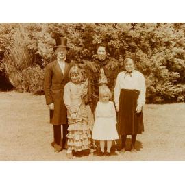 Family in old-fashioned costumes