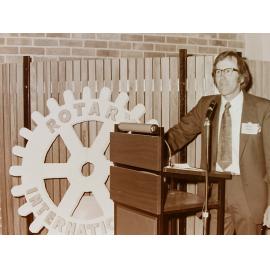 Man making a speech at a Rotary function in Lincoln