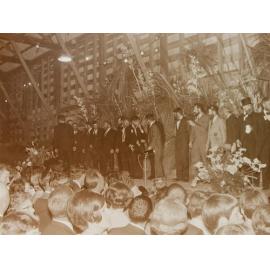 Prize-giving at period dress-up party 