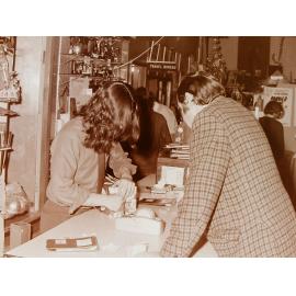 Gift wrapping at shop counter