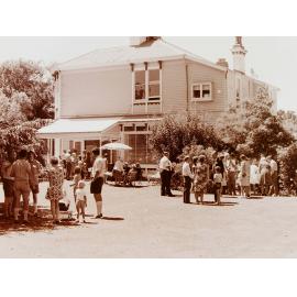 Family party outdoors at house