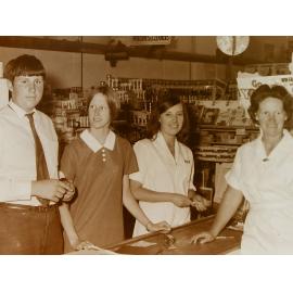 Shop Assistants at Grocery Counter