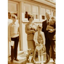 Family standing outside church