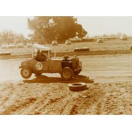 Sprint car racing on dirt track