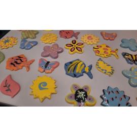 Tiles decorated by Waitaha School for Te Ara Ātea's gardens