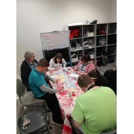 Students from Waitaha School decorating tiles for Te Ara Ātea's gardens