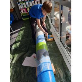 Glentunnel School students painting poles for Te Ara Ātea