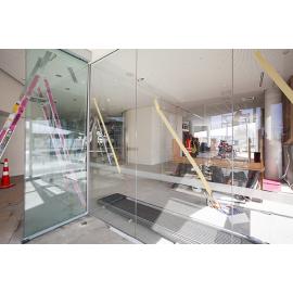 Glass panel installation in Te Ara Ātea