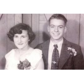 Dressed up couple at party