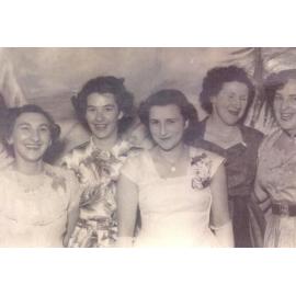 Group of women in dresses 