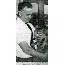 Springfield's stationmaster Mr. Don Keen, with station cat Mrs McIntyre