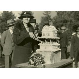 Mrs. Naismith cutting the cake at the Annat School Golden Jubilee 1936