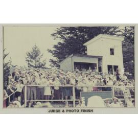 View of judge and photo finish area at farewell meeting of the Hororāta Trotting Club, Hororāta Racecourse, 10 March 1984