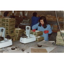 Woman packing mushrooms at Meadow Mushrooms factory, Prebbleton