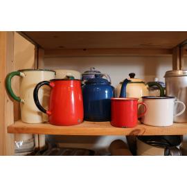 Enamel jugs at the Terrace Station kitchen museum, 2023