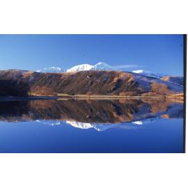 Reflections in Moana Rua Lake Pearson