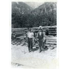 Two Ōtira Tunnel workers with shovels