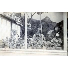 Phillip Rousham tending his plants