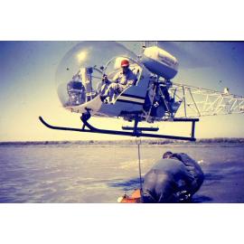 Helicopter used for eel fishing in Te Waihora Lake Ellesmere