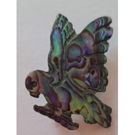 Pāua shell kea brooch carved by Oscar Coberger