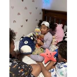 Brielle reading at bed-time