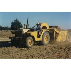 Graeme Howden earthmoving on the reserve area on State Highway 1 opposite Rolleston Railway Station