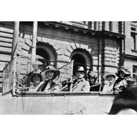 Cars leaving Cathedral Square for 'Monster Picnic' at Selwyn Huts
