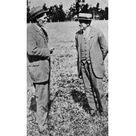 Two men talking 