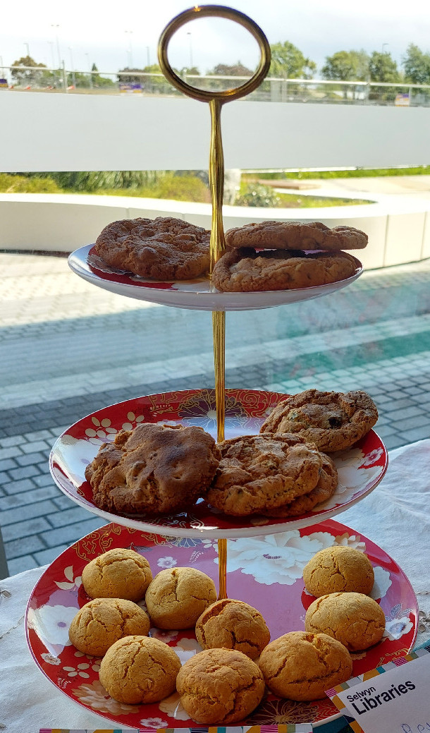 Jean Foster Pearson's Honey Gold Crisp Biscuits (lower level of cake-stand) at the 2023 Heritage Bake and Share Event, Te Āra Ātea, 15 October 2023.
