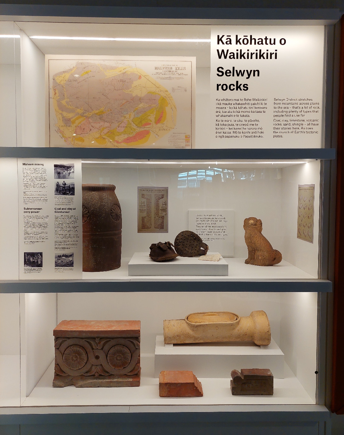 The exhibition case Kā kōhatu o Waikirikiri: Selwyn rocks, on level one of Te Ara Ātea.