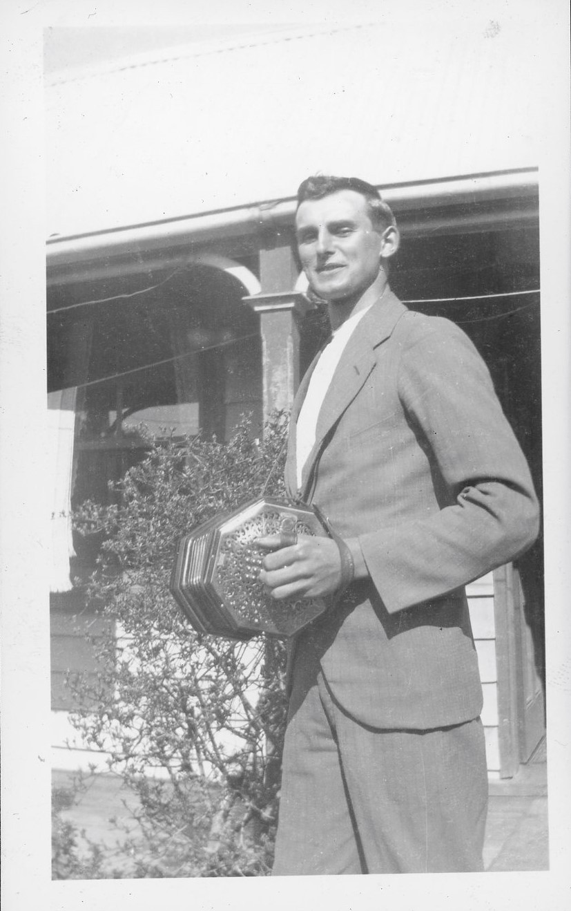 T. E. (Tom) Pearson (Jnr.) as a young man, playing the concertina. Courtesy Peter Pearson and Marianne King Collection.